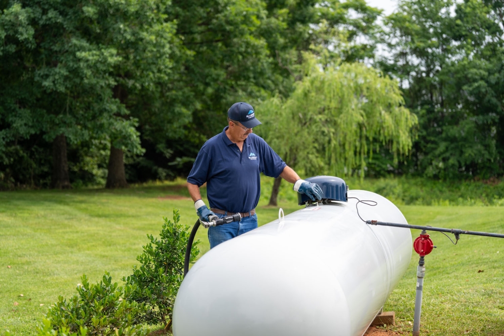 service technician preparing to fill a propane tank