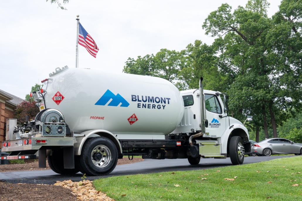 propane truck with an American flag in the background