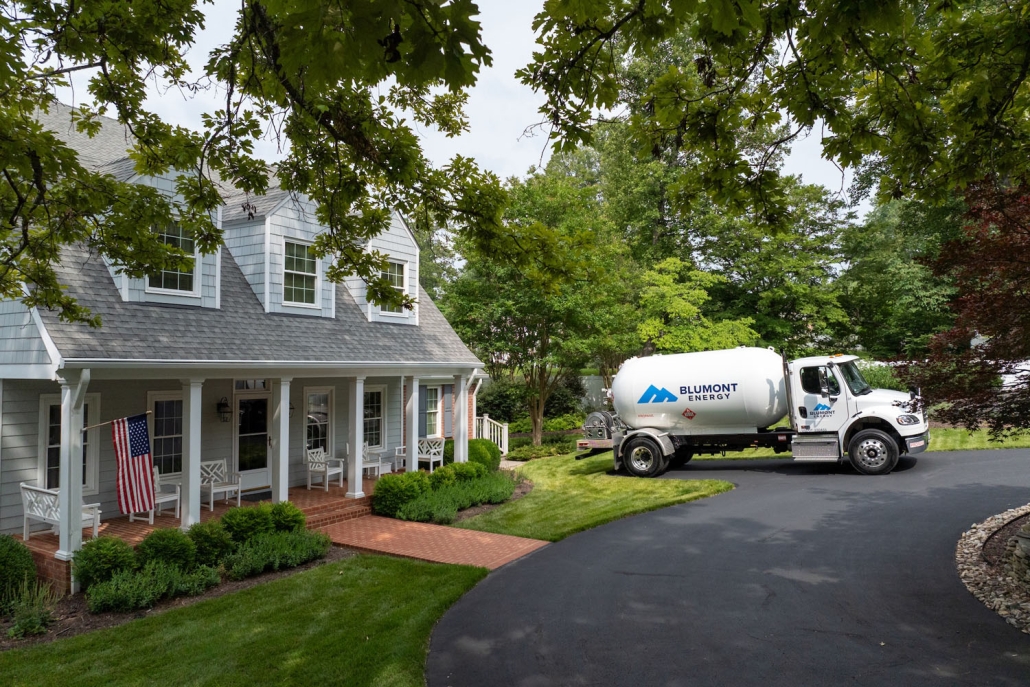 propane truck parked at a customer's home
