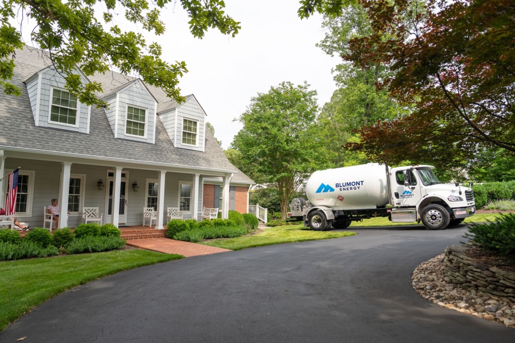 propane truck parked at a customer's home