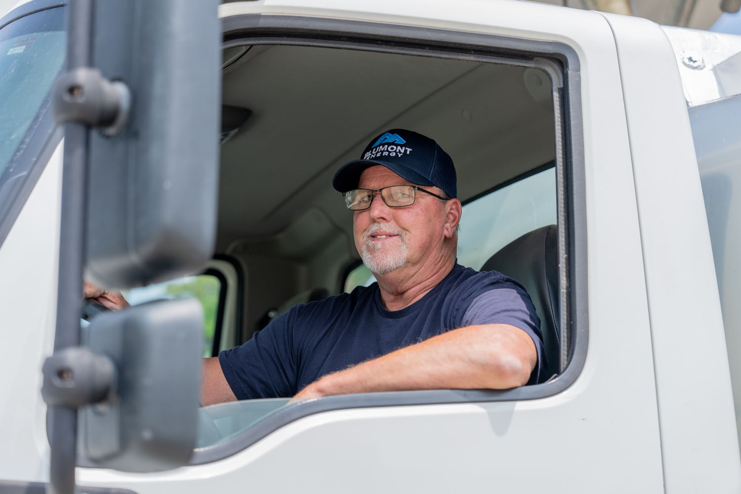employee driving a fuel truck