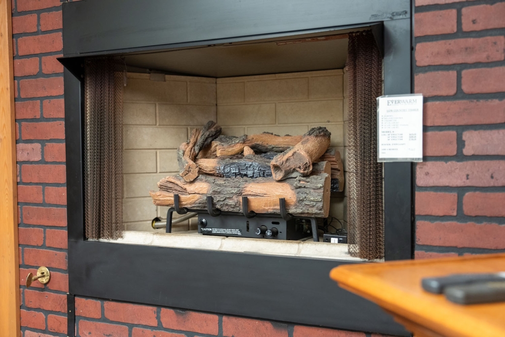 fireplace log set in a showroom