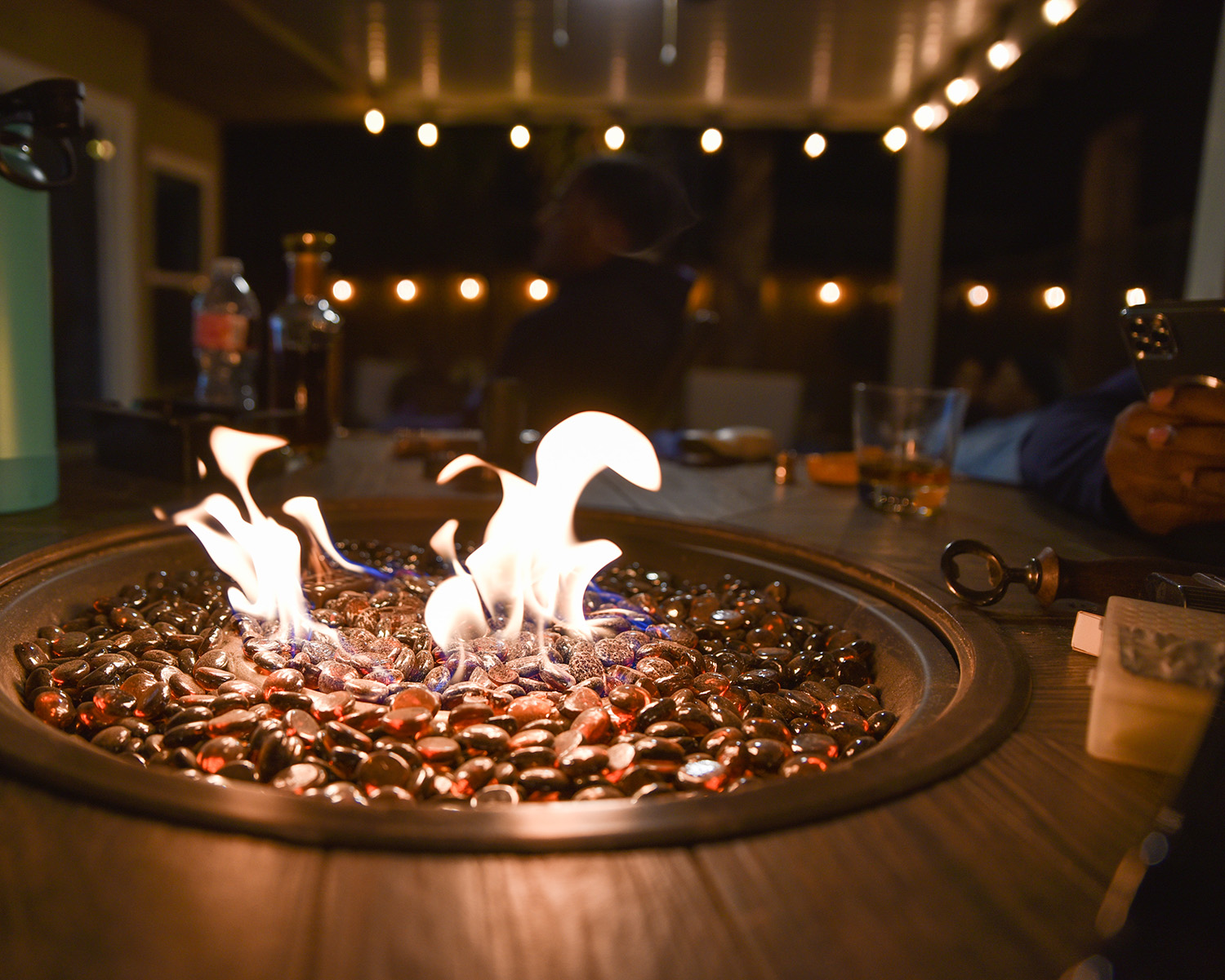 outdoor-party-scenes-with-a-tabletop-fire-pit-2025-01-08-11-43-39-utc
